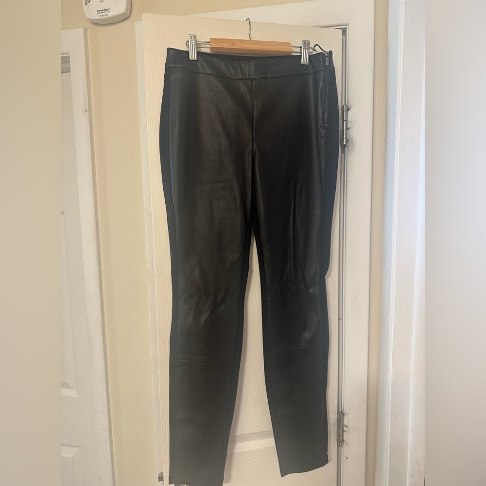 Size 4 vegan leather slim pants. Never worn. Vegan leather only in front